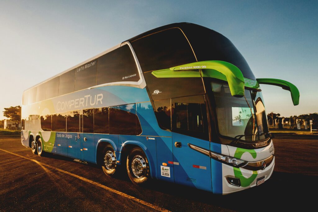 Luxury ZoloBus coach bus for Business Traveler Shuttles arriving at a corporate hub