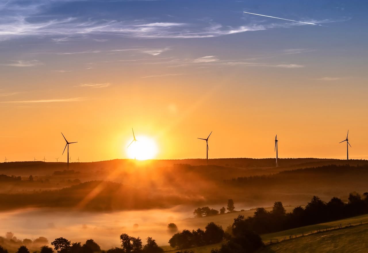 Eco Friendly NYC to DC Bus: A First-Timer's Honest 2026 Test 2 sunrise, wind farm, wind park, wind power plant, windmills, wind turbines, wind energy, renewable energy, nature, morning mist, sunlight, landscape