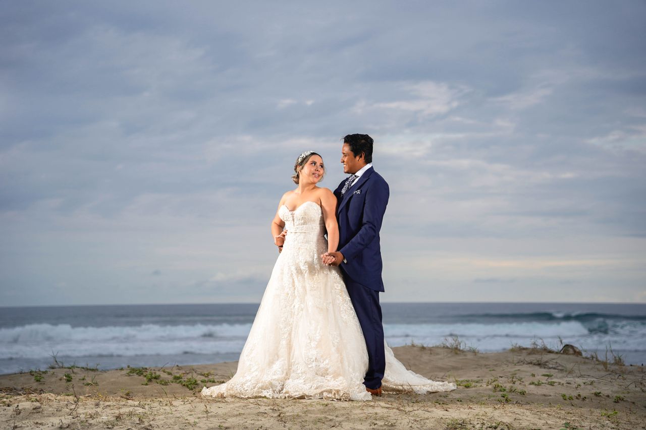 Cape May County wedding transportation – bride and groom beach wedding with Zolo vans