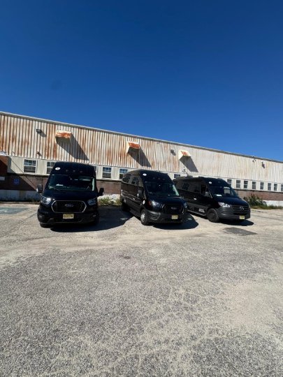 Ford Transit van side view - Zolo passenger van service