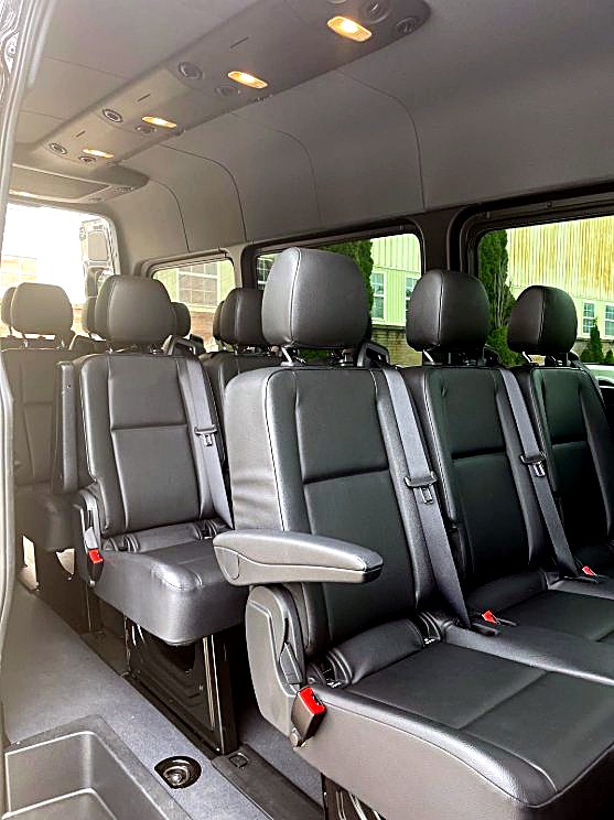 Inside a Zolo van — captain chairs for group travel