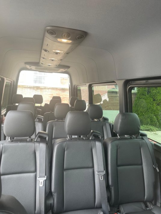 Van interior rows of leather seats - Zolo passenger van South Jersey